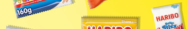 Four packaged snack products arranged on a bright yellow background: a Haribo Starmix bag, a Kinder Bueno chocolate bar, a Haribo Strawberry Sweets bag, and a Haribo Baka Stix pack.