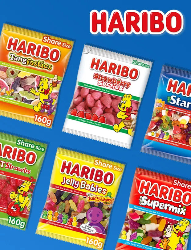 Six bags of HARIBO share-size gummy candies arranged on a bright blue background, with the large HARIBO logo at the top. Visible flavors include Tangtastics, Strawberry Squiddy, Star Wars, T Strawbs, Jelly Babies, and Supermix.