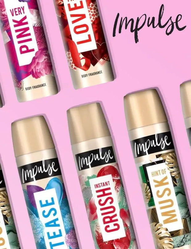 A promotional collage of Impulse body fragrance spray bottles arranged diagonally on a pink background, showing scents including Very Pink, Lover, Crush, and Hint of Musk.