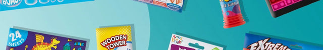 A collage of colorful children's toys and activity items on a bright aqua background, including bubble camera, crayons, a pegboard toy, a tube of bubble pop, placemats, a wooden tower game, colored pencils, and a dart gun set.